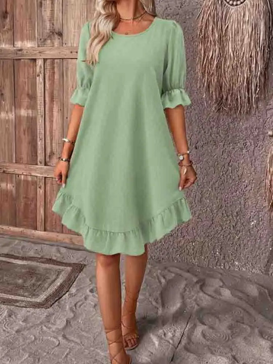 Dress with ruffles and 3/4 sleeves