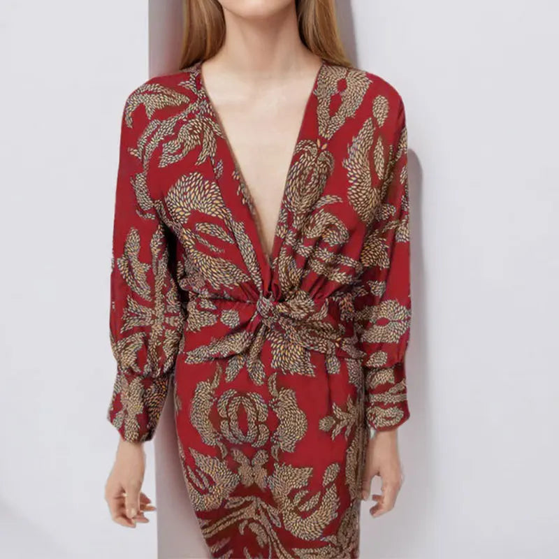 Dames midi jurk met een wikkeldecolleté en een bloemenpatroon