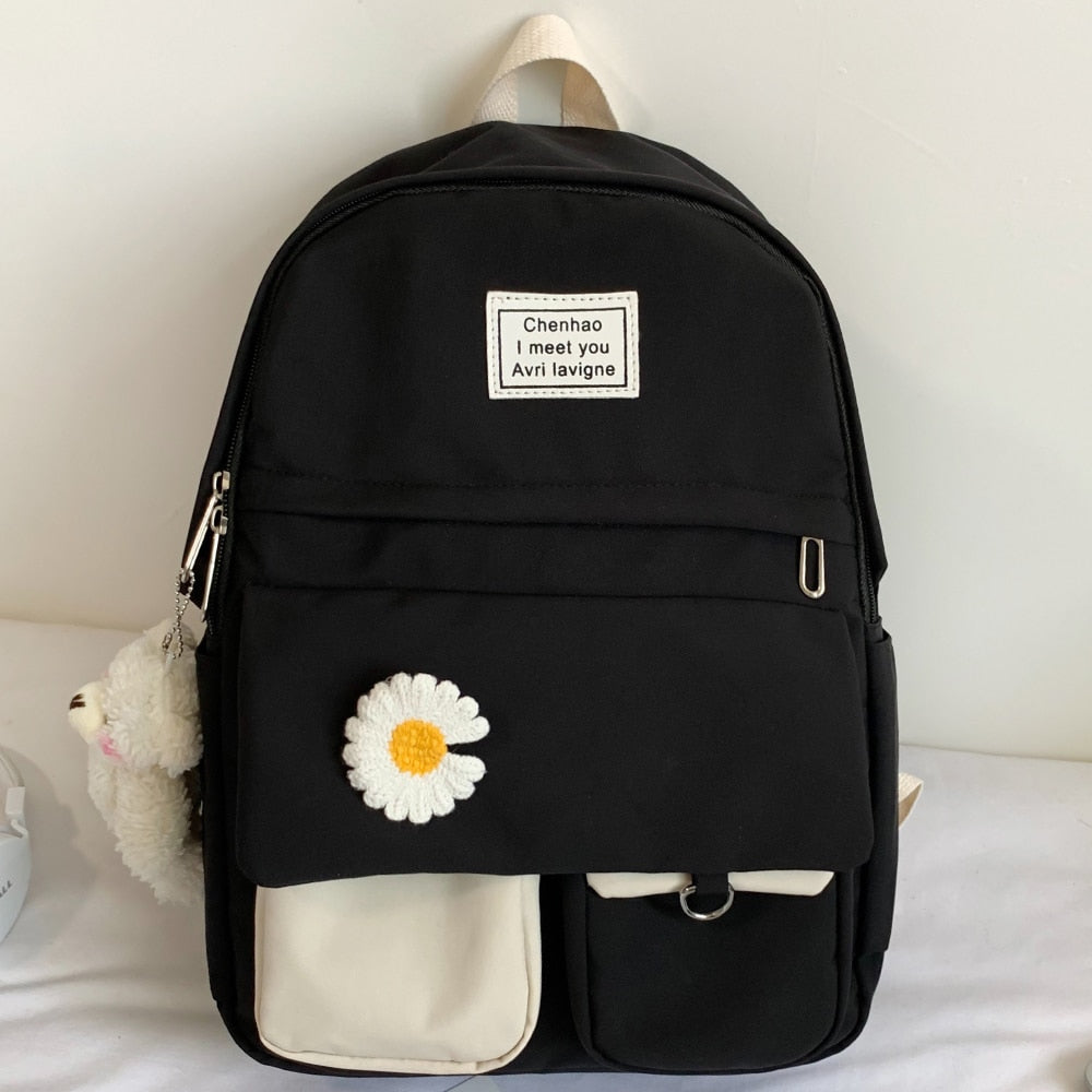 Spacious school backpack with floral application 