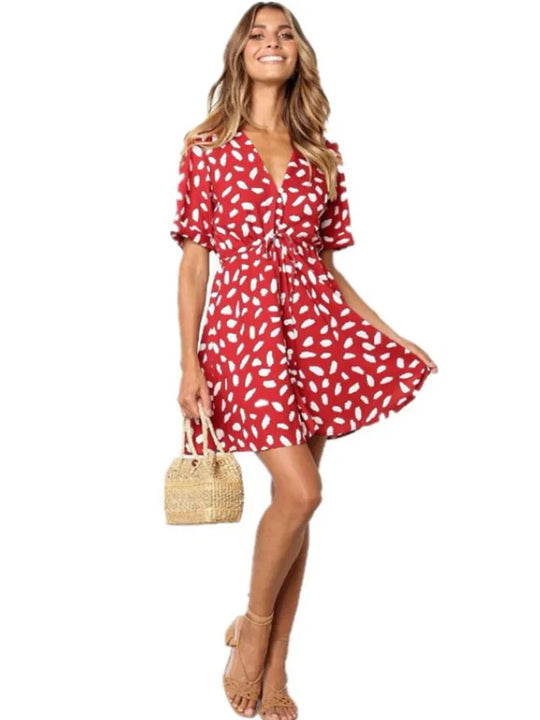 Summer dress with deep V-neck and waistband