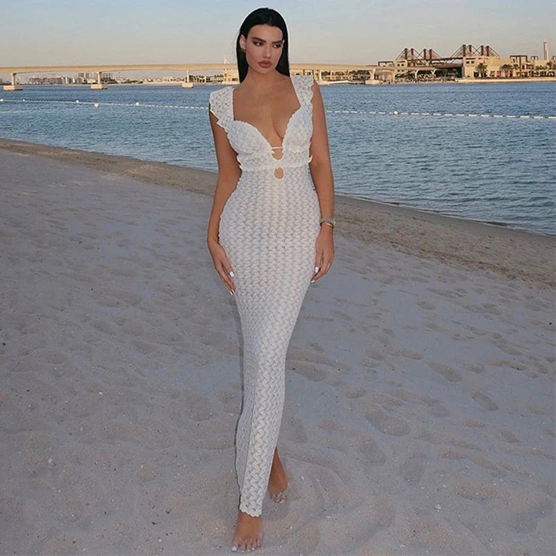 Sensuele maxi-jurk met diepe decolleté en luchtig patroon