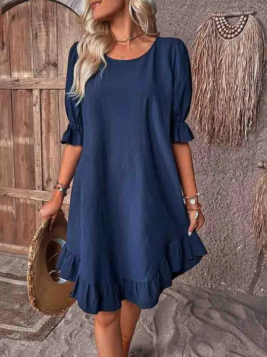 Dress with ruffles and 3/4 sleeves