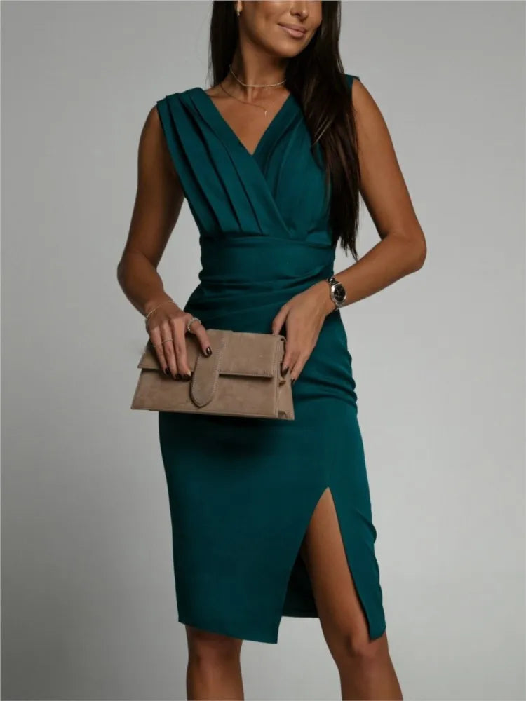 Elegant cocktail dress with pleats and a slit