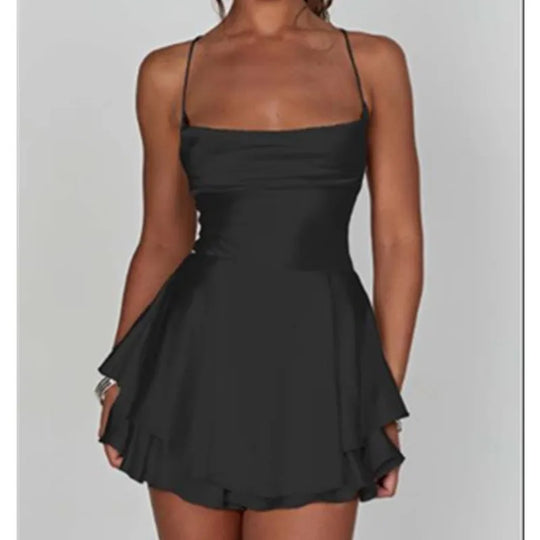 Satin women's jumpsuit dress with ruffles and bow detail on the back