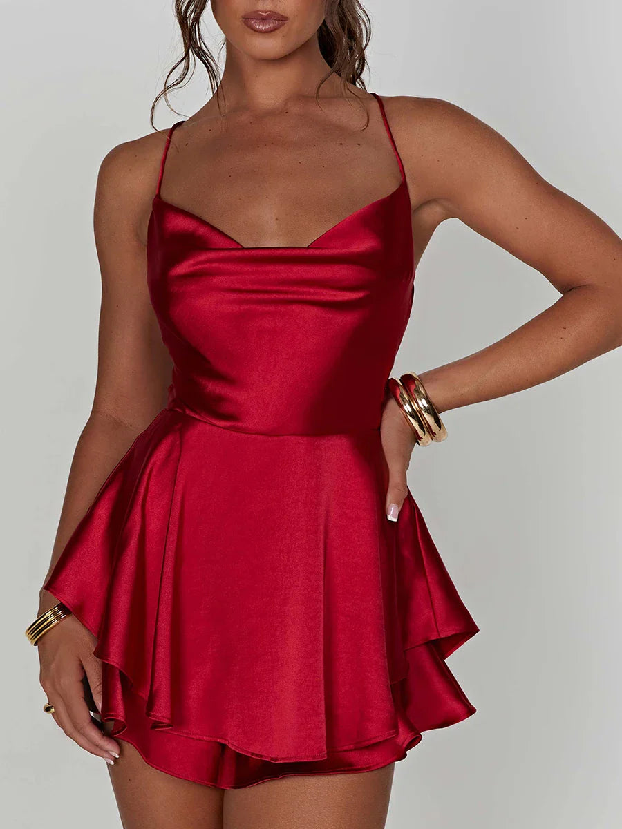 Satin women's jumpsuit dress with ruffles and bow detail on the back