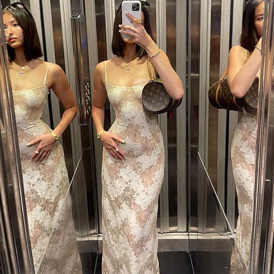 Elegant Maxi Dress with Lace Pattern and Bow on the Back