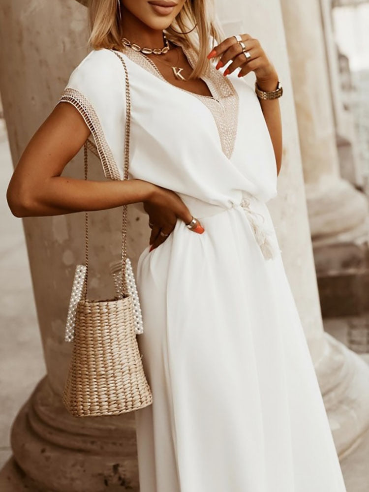 Elegante damesjurk met decoratieve details