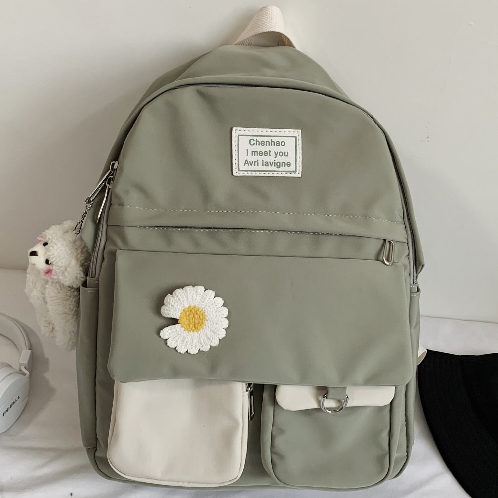 Spacious school backpack with floral application 