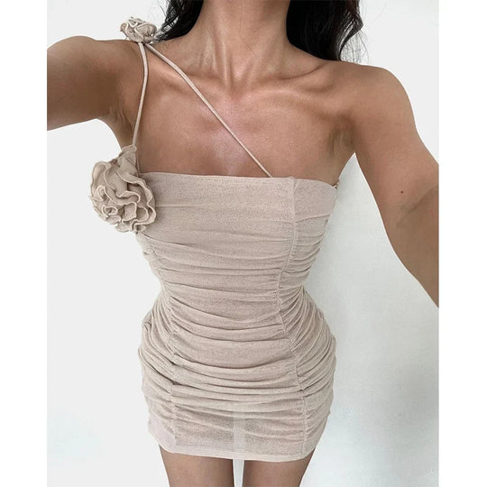 Sensual mini dress with pleats and a decorative flower
