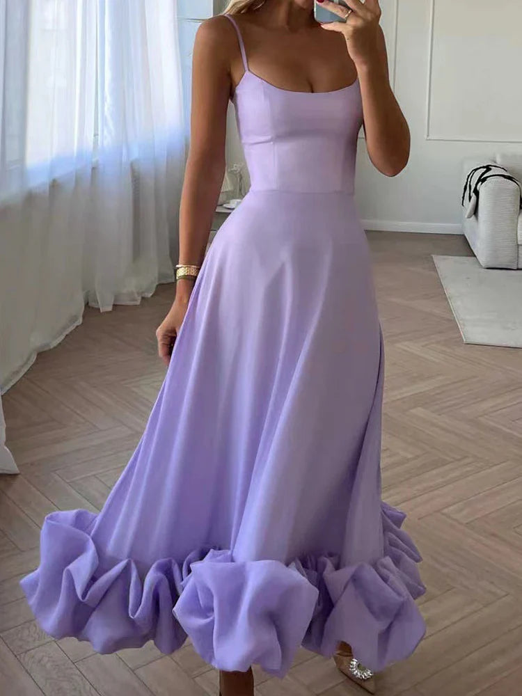 Elegant dress with spaghetti straps and ruffles
