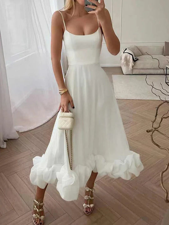 Elegant dress with spaghetti straps and ruffles