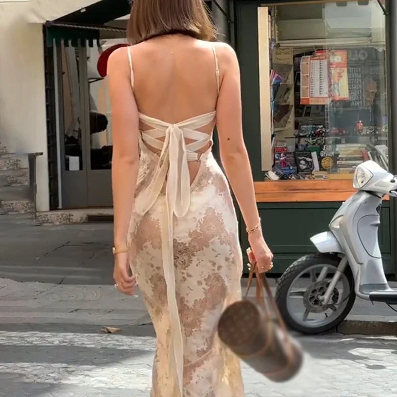 Elegant Maxi Dress with Lace Pattern and Bow on the Back