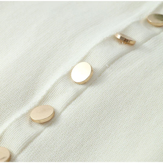 Sleeveless midi knitted dress with buttons