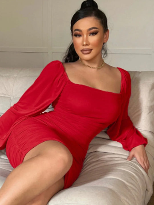 Elegant pencil dress with pleats and puff sleeves