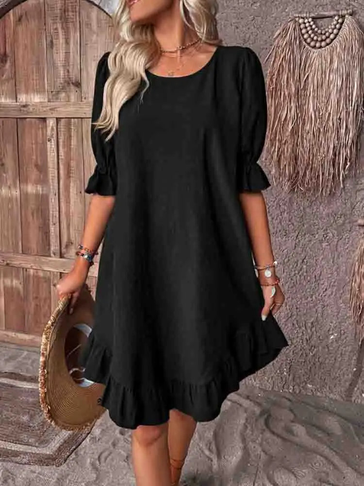 Dress with ruffles and 3/4 sleeves