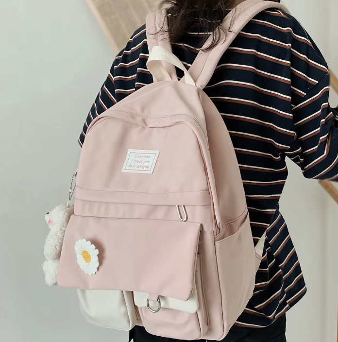 Spacious school backpack with floral application 