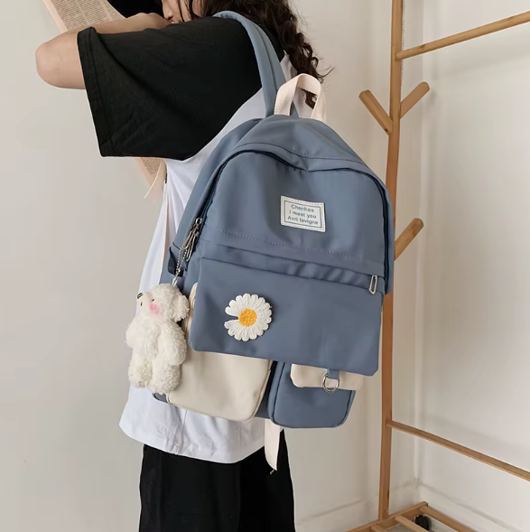 Spacious school backpack with floral application 